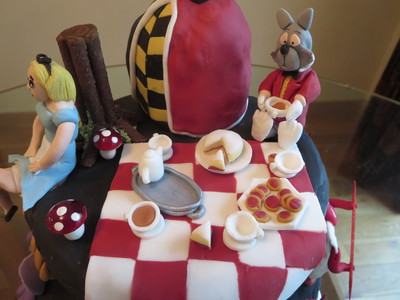 picture of Alice in wonderland
 cakes